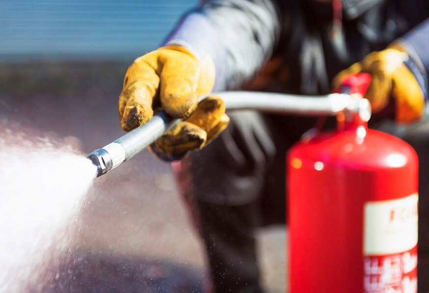 Foam fire extinguisher in action